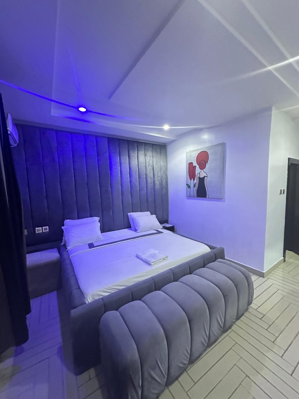 Grey velvet suite with soft mood lighting