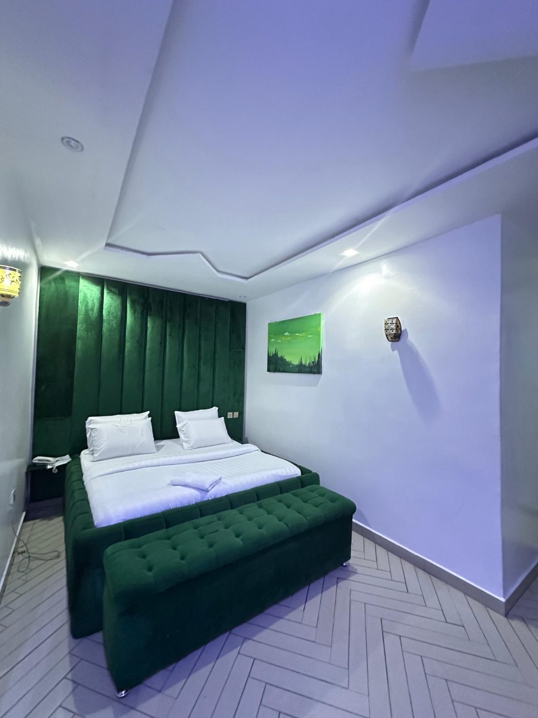 Emerald green suite with herringbone flooring